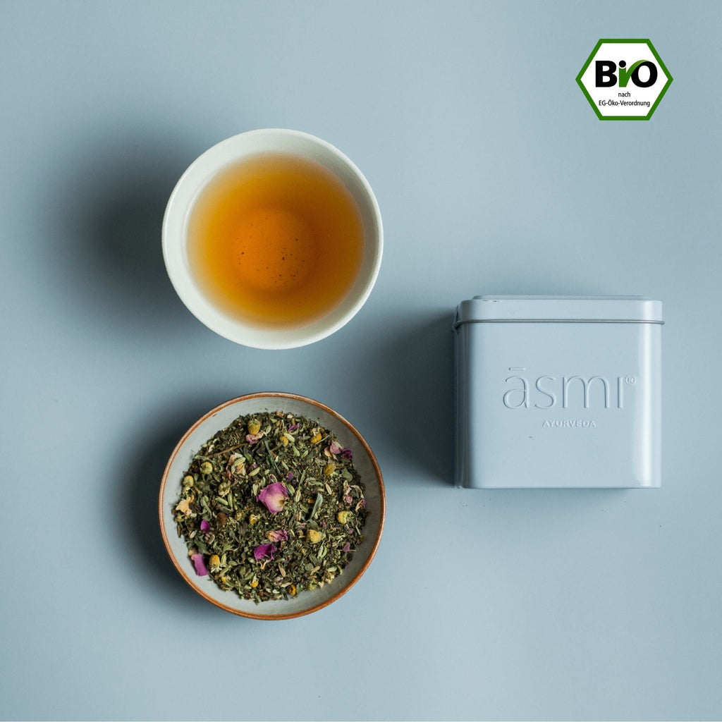 Relaxing tea with chamomile and rose petals