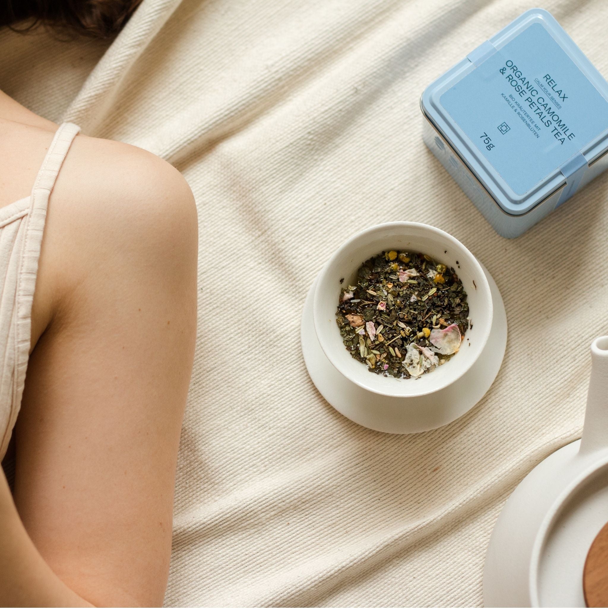Relaxing tea with chamomile and rose petals